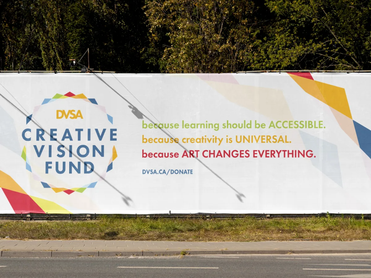 Mockup of an outdoor ad for the DVSA Creative Vision Fund fundraising campaign branding. Messaging reads: "Because learning should be accessible. Because creativity is universal. Because art changes everything."