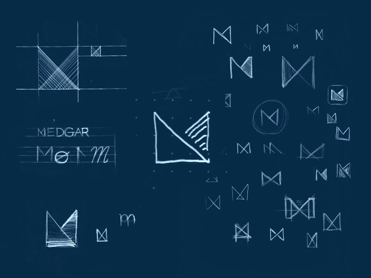 Compilation of sketches from the development of the Medgar brand showing the evolution of the idea that would lead to the final Medgar icon.
